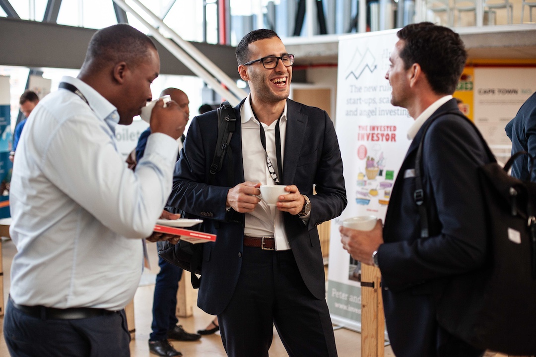 Business men in a conference networking.